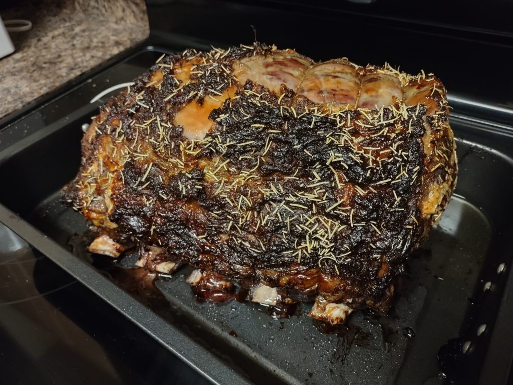 Prime rib with rosemary, perfectly cooked.